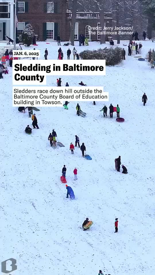Watch sledders take to the big hill at the Baltimore County Board of Education building on Charles Street in Towson.