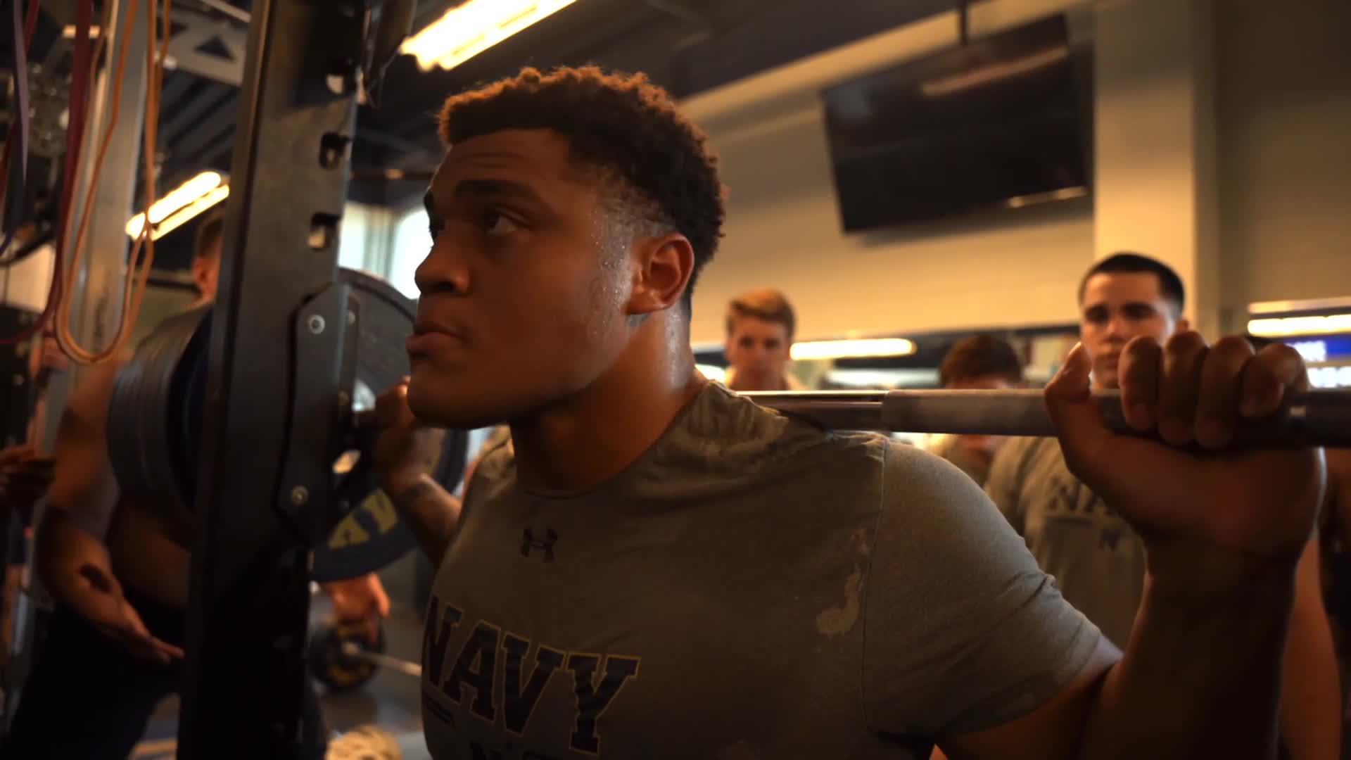 Senior nose guard Landon Robinson squats over 600 pounds in the U.S. Naval Academy weight room. Robinson has been cited on The Athletic’s Freak List for three consecutive years for his heavy lifts and 20 mph speed on the field.